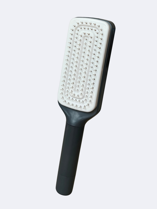 Self-cleaning hairbrush